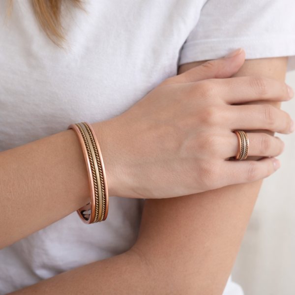 Model Wearing Classic Copper Bracelets or Ring Set with Gift Bag Handmade 99.999% Genuine Copper Jewelry Anti- Inflammation Electron Release Model Wearing Classic Copper Bracelets or Ring Set with Gift Bag Handmade 99.999% Genuine Copper Jewelry Anti- Inflammation Electron Release
