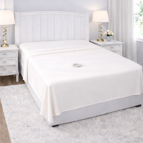 Beige flat grounding and earthing bed sheet by Redemption Shield.